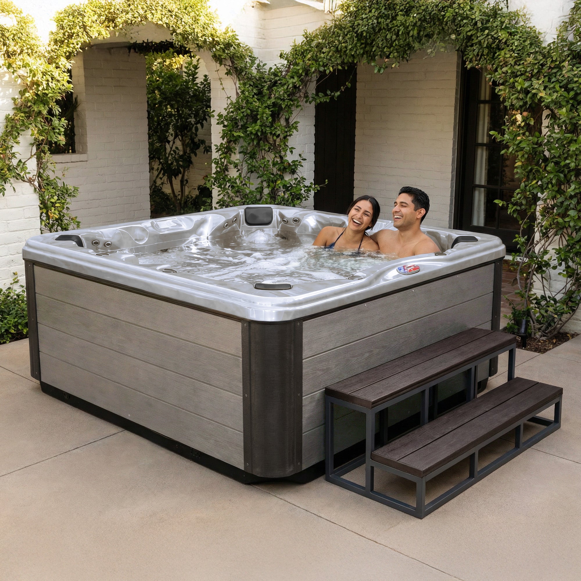 American Spas AMZ745B 7-Person 45-Jet Premium Acrylic Bench Spa Standard Hot Tub with Ozonator and Bluetooth Sound System
