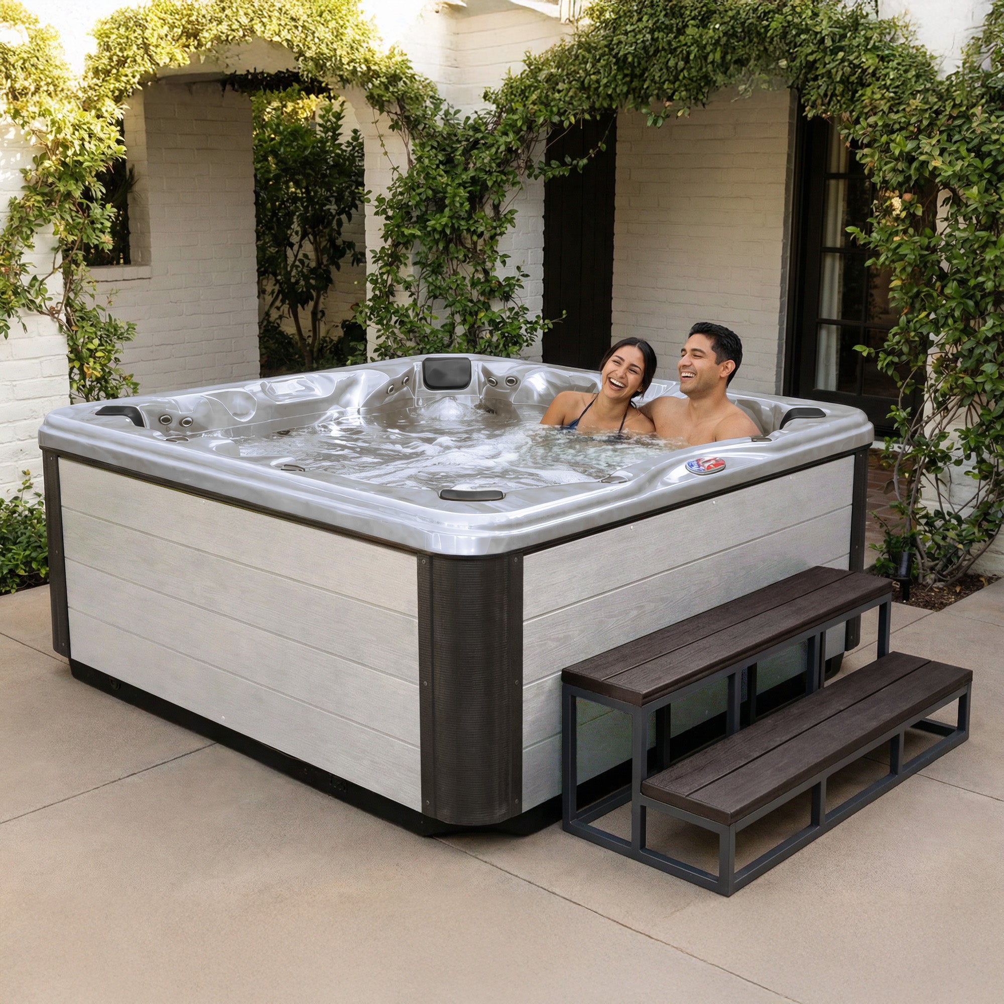 American Spas AMZ745B 7-Person 45-Jet Premium Acrylic Bench Spa Standard Hot Tub with Ozonator and Bluetooth Sound System